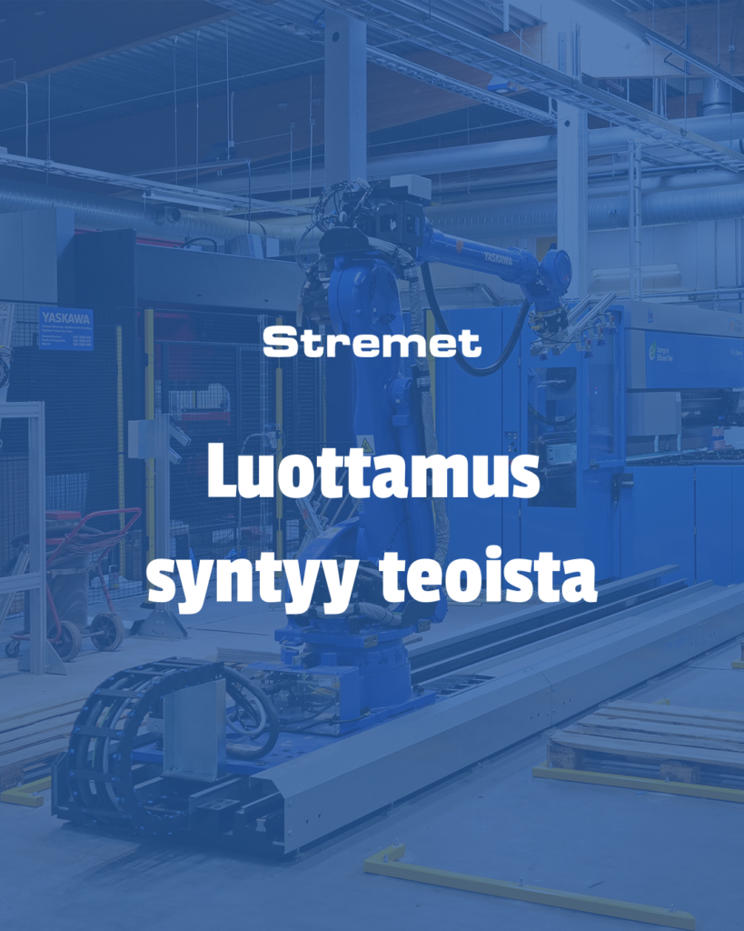Robottikäsivarsi teollisessa työpajassa, jossa on tekstin päällekkäisyys: Stremet Luottamus syntyy teoista, joka suomeksi käännettynä tarkoittaa Luottamus rakentuu toiminnasta.